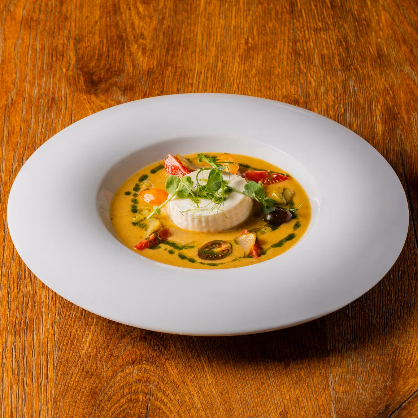 Tomato, burrata and yellow chili sauce