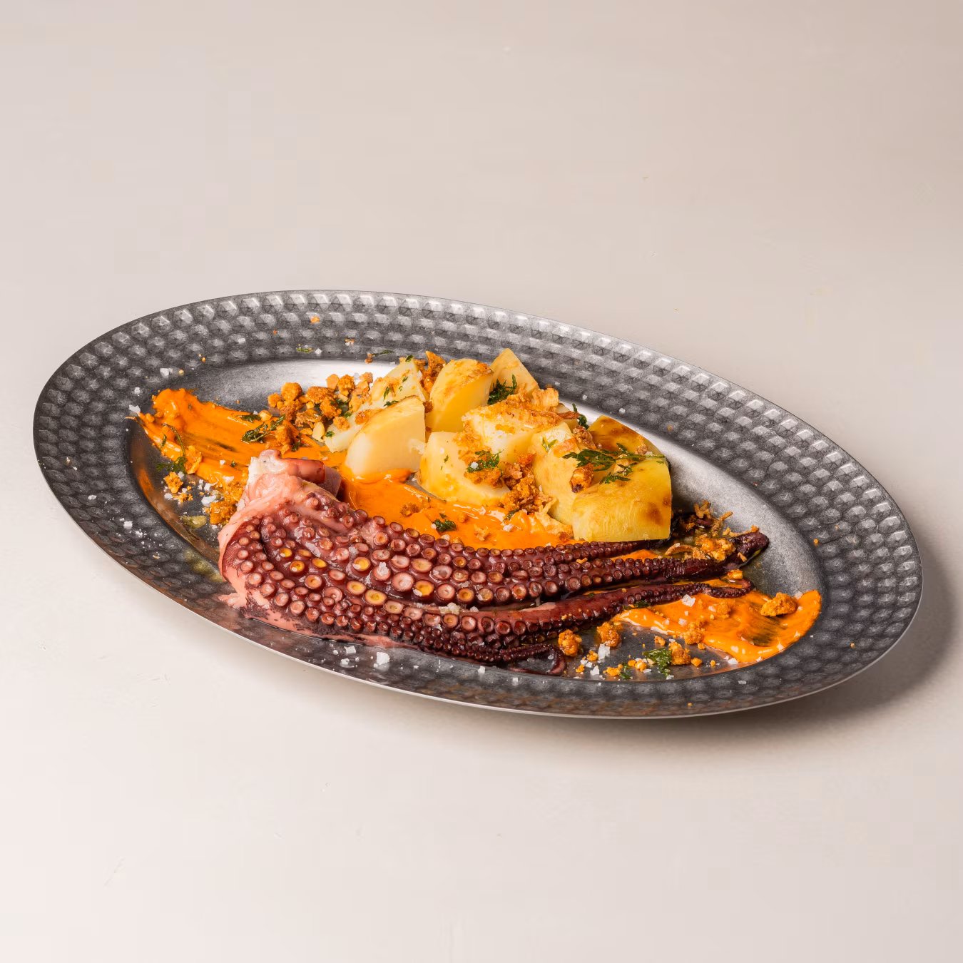 Octopus with Vera's red pepper aioli and "romesco migas"