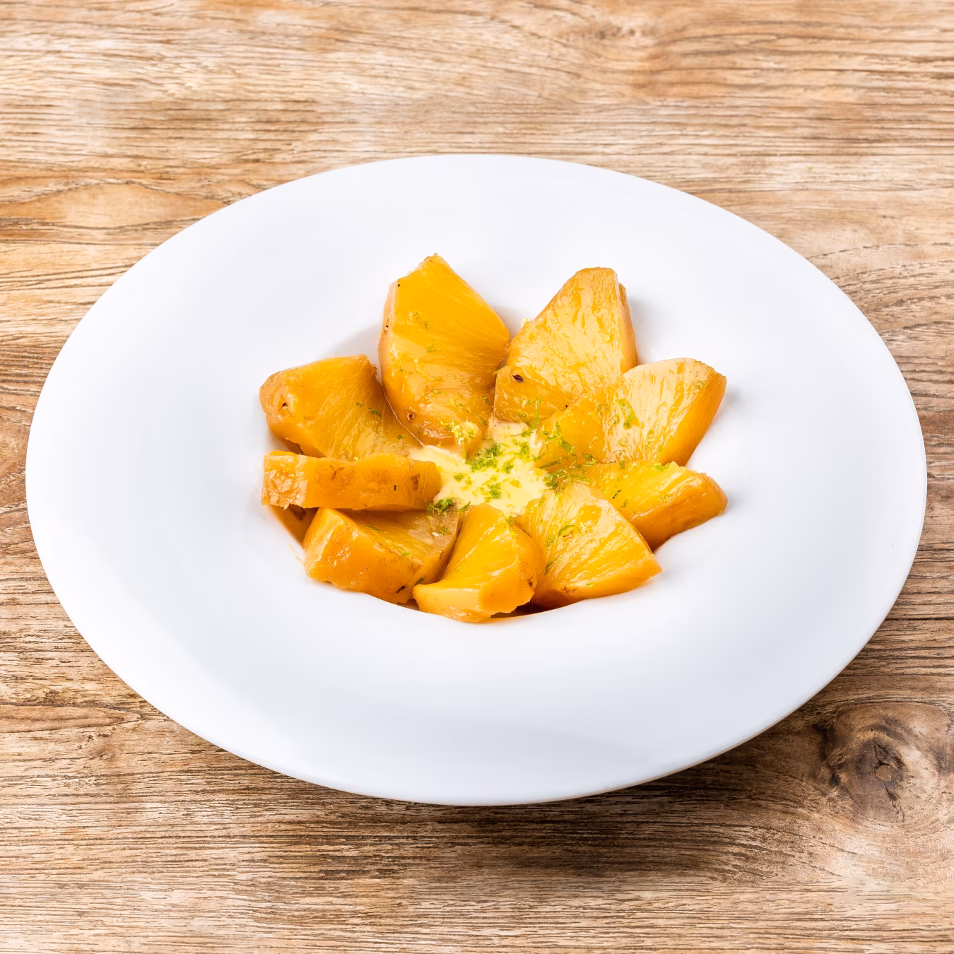Grilled pineapple with passion fruit sauce