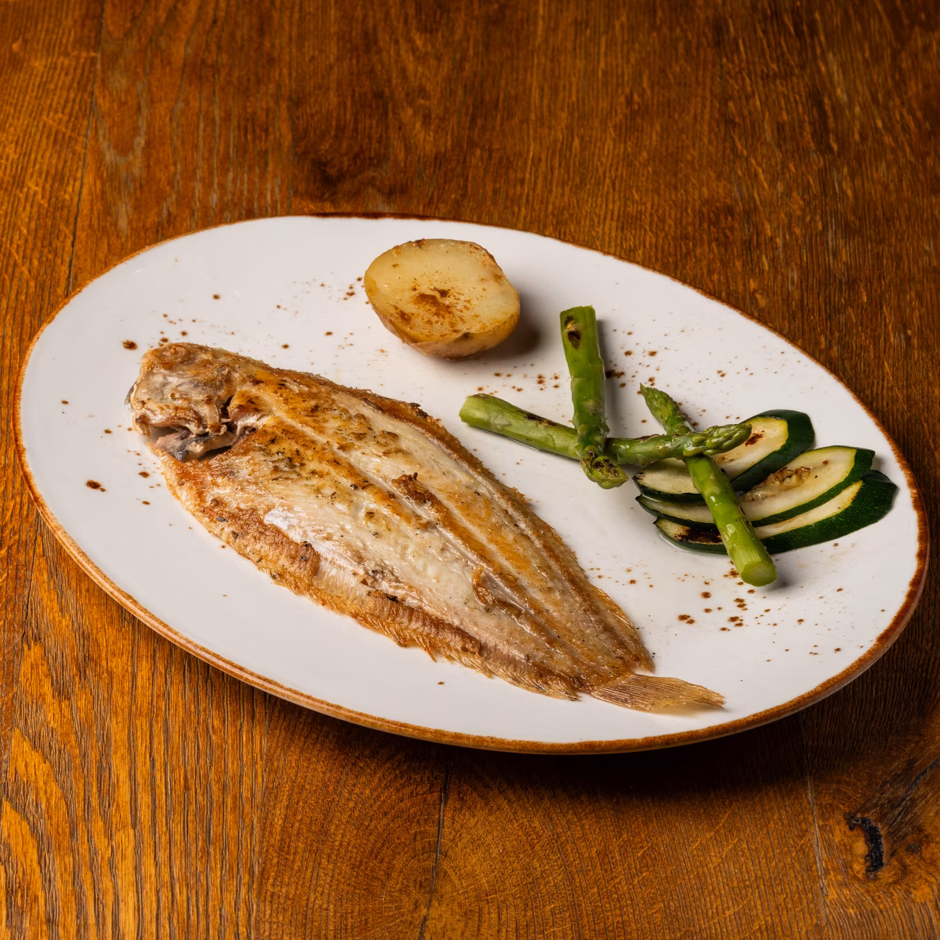 Grilled sole with vegetables